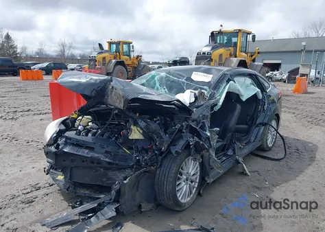 2014 Ford Focus Titanium from USA, damaged, VIN 1FADP3J27EL234873